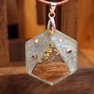 Hexagon wood and resin necklace with a pyramid theme