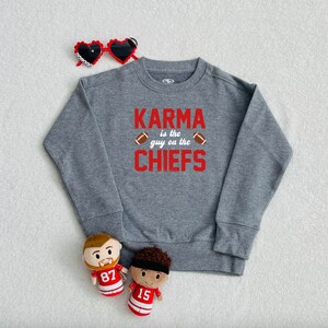 Karma is the guy on the Chiefs Trendy Football Crewneck Sweatshirt, T Swift Swiftie Fans, Gift for Kelce fans