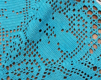 Vintage style turquoise blue and white doily