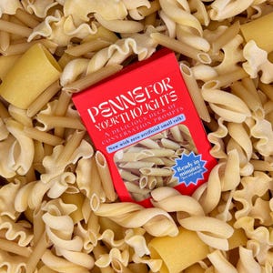 May include: A red box labeled "PENNEFOR YOUR THOUGHTS" sits amidst various pasta shapes. The box contains conversation prompts. The pasta includes penne, rotini, and other shapes. The text on the box reads "Ready in minutes!"