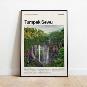 May include: A vertical wall art print featuring a photograph of the Tumpak Sewu waterfall in East Java, Indonesia. The poster has a cream background, black text reading Tumpak Sewu and Indonesia, and a descriptive paragraph at the bottom.