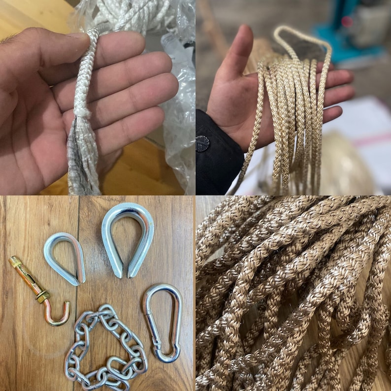 May include: A close-up of a set of metal hardware for hanging a hammock. The set includes two metal rings, a chain, a hook, and a screw-in eye bolt. The hardware is silver in color.