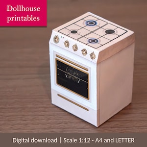 Peut inclure: Un petit four de poupée blanc et beige avec une plaque de cuisson imprimée à quatre brûleurs. La porte du four est noire avec un cadre doré. Le texte "Dollhouse printables" est dans un encadré rose. Le texte "Digital download | Scale 1:12 - A4 and LETTER" est en bas.