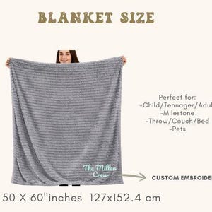 May include: A gray, custom embroidered blanket, measuring 50 x 60 inches. The blanket has a textured surface and features the text "The Miller Crew". The image also includes the text "BLANKET SIZE".