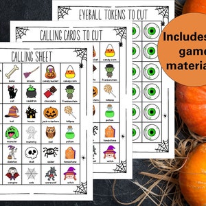 K&ouml;nnte beinhalten: Ein druckbares Halloween-Spielset mit einem Anrufblatt, Anrufkarten und Augen-Spielmarken. Das Spiel enth&auml;lt eine Vielzahl von Halloween-Motiven, darunter Flederm&auml;use, K&uuml;rbisse, Hexen und Geister.