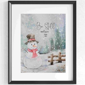 May include: A watercolor painting of a snowman in a snowy winter scene with a quote that reads "Be Still and Know" with the verse reference "Psalm 46:10".