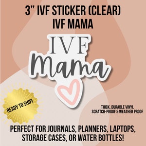 May include: A 3-inch clear vinyl sticker with the text "IVF Mama" in gray and pink lettering. The sticker features a heart design and the words "Ready to Ship!" in gold.