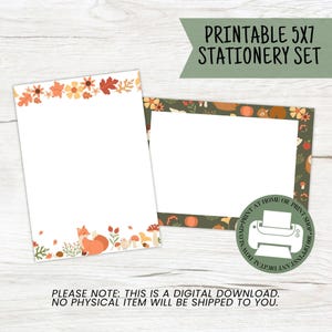 May include: A printable 5x7 stationery set with a seasonal autumn theme. The set includes a lined sheet with a fox and floral design, and a blank card with a similar pattern. The text reads "Printable 5x7 Stationery Set".