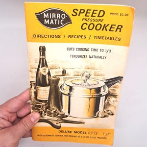 May include: Vintage Mirro-Matic Speed Pressure Cooker booklet. The cover is yellow with black and white illustrations of a pressure cooker, wine bottle, and other kitchen items. The booklet promises to cut cooking time and tenderize food naturally. The model number is 0398.