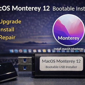 May include: A black USB flash drive labeled MacOS Monterey 12 Bootable USB Installer with a matching cap. The text on the screen reads MacOS Monterey 12 Bootable Installer, Upgrade, Install, Repair, and Install macOS Monterey.