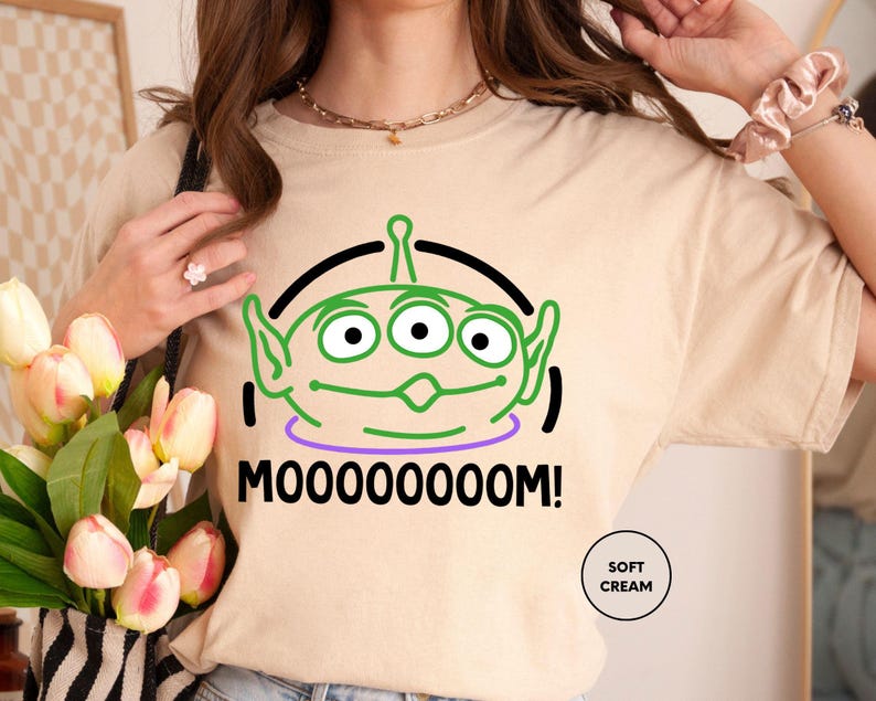 a woman wearing a t - shirt that says mooooooooooooo