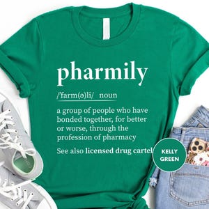 a t - shirt that says pharmily next to a pair of jeans