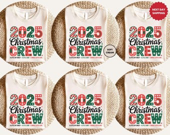 May include: Six cream-coloured t-shirts with the text "2025 Christmas CREW" in red and green. The shirts have the phrase "A LITTLE BIT CRAZY - A LITTLE LOUD - A WHOLE LOTTA LOVE" below the main text. One shirt has a "NEXT DAY SHIPPING" sticker.