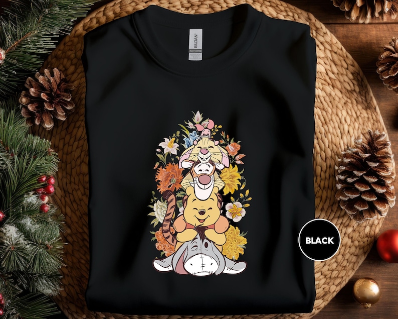 a black shirt with a cartoon character on it