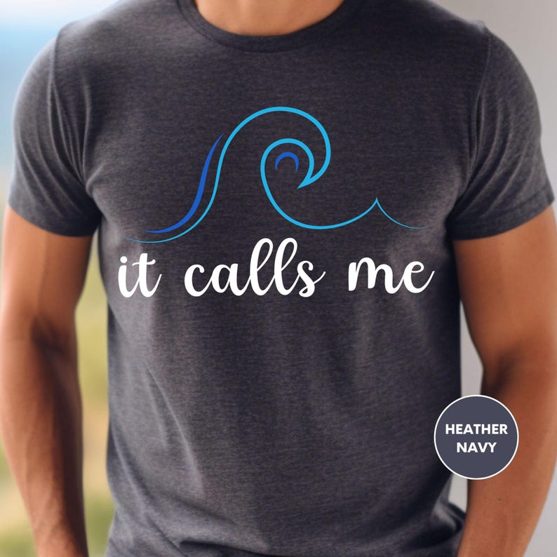 a man wearing a t - shirt that says it calls me