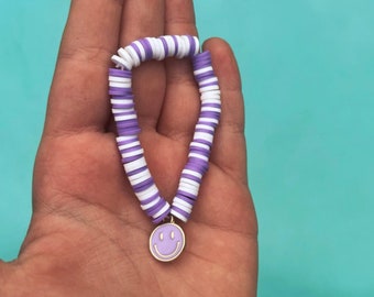 Pulsera de cara sonriente preppy púrpura