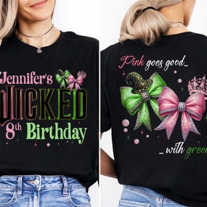 May include: Black t-shirt with a birthday design. The front features the text "Jennifer's Wicked 8th Birthday" in pink and green. The back of the shirt says "Pink goes good... with green" with bow graphics and a crown.