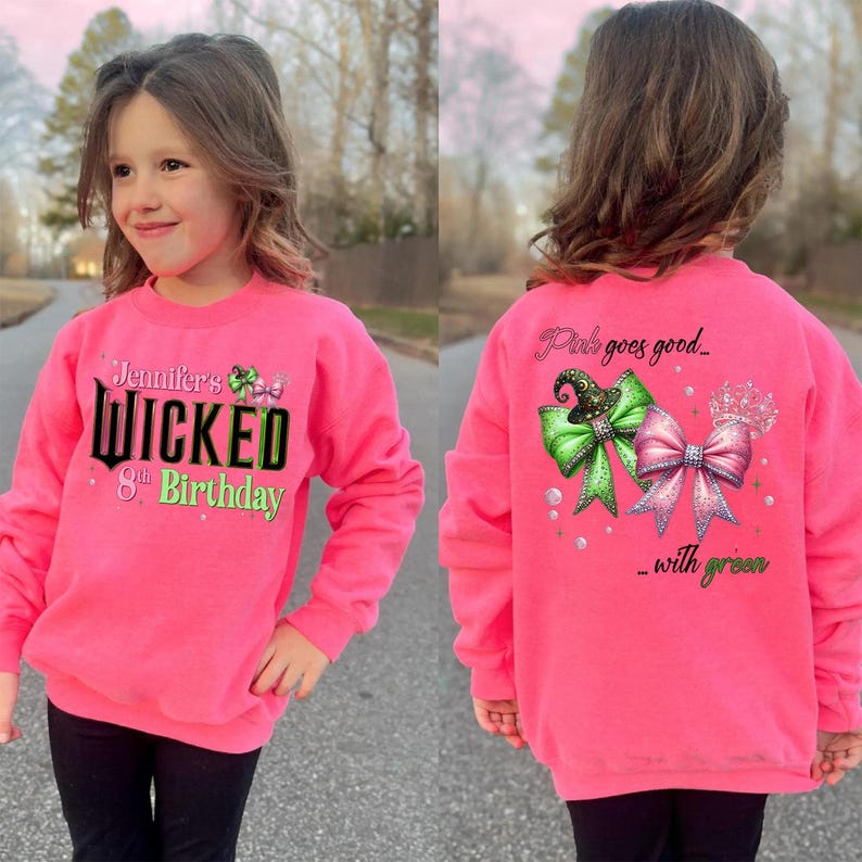 May include: A bright pink sweatshirt with the text "Jennifer's Wicked 8th Birthday" on the front. The back of the sweatshirt features the text "Pink goes good_ with green" with bow and crown graphics.