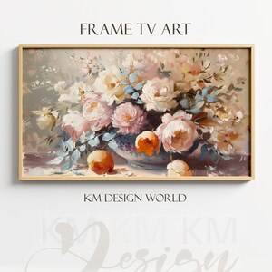 May include: A framed painting of a still life featuring a bouquet of pink, white, and yellow flowers in a blue and white vase. The flowers are arranged in a vase on a table with three peaches in front of the vase. The painting is set against a light gray background.