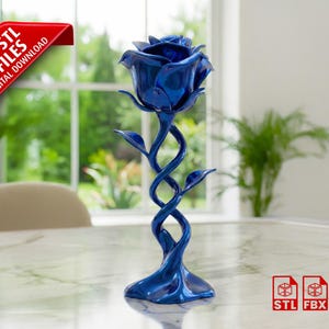 May include: A glossy, deep blue rose sculpture with a spiraling stem and three leaves. The rose is on a marble-like surface. A red banner in the upper left corner reads "3D STL FILES DIGITAL DOWNLOAD".