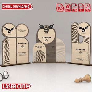 May include: Three laser cut wooden award plaques with a honeycomb design and the text "Excellence Award" and "Your Name".