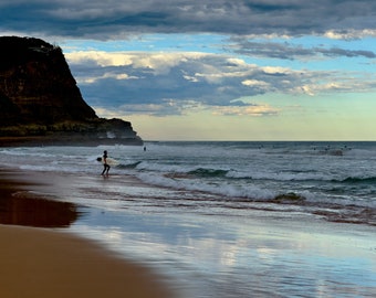 Surfer entering Pacific and North Avoca