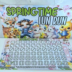 May include: A board game with the title "Springtime Fun Run" featuring cartoon animals and dice patterns. The game board has a grid of dice patterns and the text "Total Saved". The top of the board has the words "Springtime Fun Run".