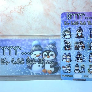 May include: A clear plastic pouch and a sticker sheet with a winter theme. The pouch features a snowman and penguin with the text "Brrrr... It's Cold Out There." The sticker sheet has penguin illustrations.
