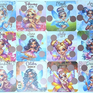 May include: A collection of twelve cards, each depicting a fairy illustration for a month. Each card features a unique fairy design, the month's name, and a scratch-off area.