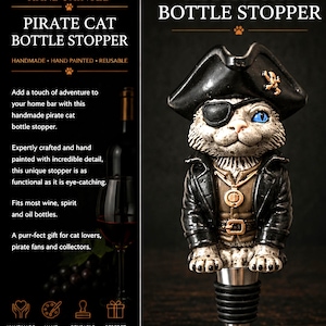 May include: A hand-painted bottle stopper featuring a cat dressed as a pirate, wearing a black tricorn hat with a gold skull emblem, a black eye patch, and a black jacket over a brown vest with a gold-coloured pendant and belt buckle.