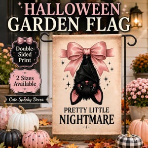 May include: A rectangular garden flag featuring a black bat hanging upside down with a large pink bow above its head. The background is a light beige color with small star icons. The text reads PRETTY LITTLE NIGHTMARE in black capital letters.