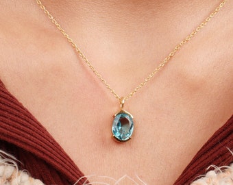 Gold-Plated Sterling Silver Blue Topaz Pendant Necklace: Adjustable Chain
