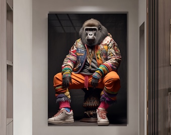 May include: A gorilla wearing a colorful patterned jacket, orange pants, and colorful socks sits on a pedestal. The gorilla is wearing a gold chain necklace and has a serious expression.