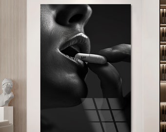 May include: A black and white photo of a person taking a pill that says "ART" on it.