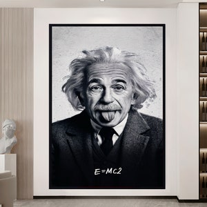 May include: Black and white portrait of Albert Einstein sticking his tongue out. The image has a grainy texture and the text "E=MC2" is written in white at the bottom.
