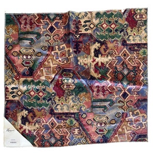 May include: A multi-colored fabric with a geometric pattern. The fabric features a mix of red, blue, green, and brown colors. The pattern is made up of repeating shapes and lines.