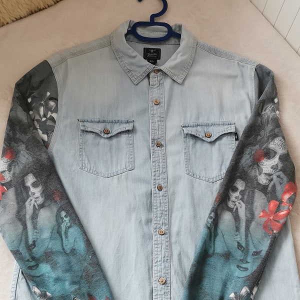 Rockerbox Detroid Denim jeans shirt men's size xl.Branded buttons, sleeves with drawings, shirt in good condition. 100% cotton.