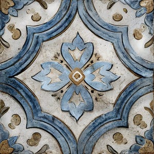 May include: Square ceramic tile with a repeating pattern. The design features a central floral motif in light blue and gold, surrounded by a geometric border in a darker blue. The background is a neutral, off-white color.