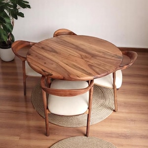 Handcrafted Round Walnut Dining Table: Rustic Solid Wood Furniture