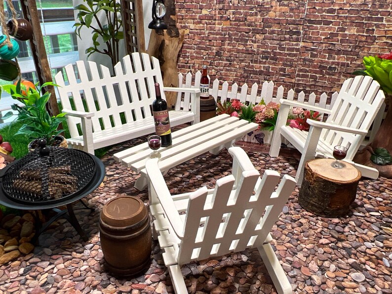 ✨ Create a Charming Miniature Garden Sitting Area! ✨
Add a touch of elegance and tranquility to your 1:12 scale dollhouse with this beautifully crafted White Adirondack Patio Set. This set includes a long bench, a long table, and two chairs, transforming your dollhouse outdoor scene into a serene and enjoyable setting.