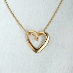 SILVER TWISTED HEART NECKLACE