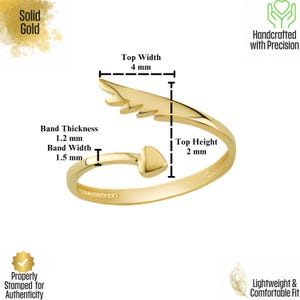 May include: A solid gold ring with an arrow design. The ring features a band width of 1.5 mm, a band thickness of 1.2 mm, and a top height of 2 mm. The top width is 4 mm. The ring is stamped for authenticity and is lightweight and comfortable.