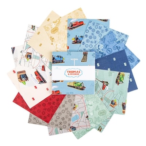 May include: A collection of fabric squares featuring various designs and colors. The squares showcase images of trains, maps, and other related graphics. The text "THOMAS & FRIENDS" is visible on a central square. The color palette includes blue, red, green, and beige.
