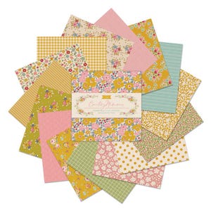 May include: A collection of colorful fabric squares arranged in a circular pattern. The squares feature floral, striped, polka dot, and gingham patterns in shades of yellow, pink, green, and blue. The center displays a label with the text "Country Memories".