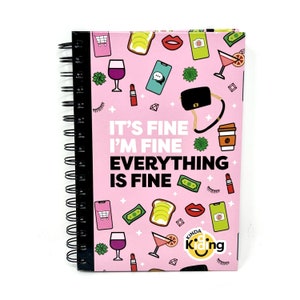May include: Pink spiral bound notebook with a black and white design featuring the text "It's fine I'm fine Everything is fine" and a smiley face with the text "Kinda Kidding".