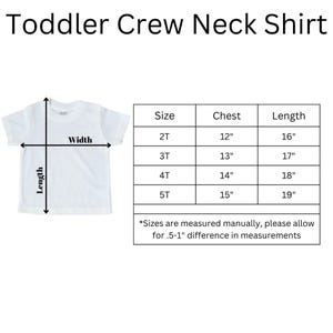 May include: A white toddler crew neck shirt with size chart showing chest and length measurements in inches for sizes 2T, 3T, 4T, and 5T. *Sizes are measured manually, please allow for .5-1" difference in measurements*