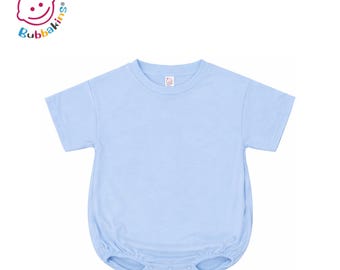May include: A light blue short-sleeved baby romper featuring a round neckline and a gathered elasticized bottom with three snap closures at the crotch. The garment includes a small interior neck label with the Bubbakins logo printed on it.