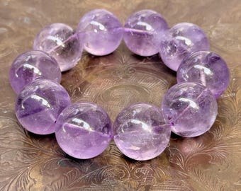 Pulsera de amatista AAAA deslumbrante: una joya única hecha a mano con colores vibrantes (22 mm).