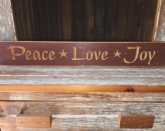 Wood sign: Peace Love Joy