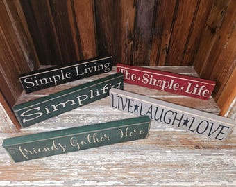 wood shelf sitter signs